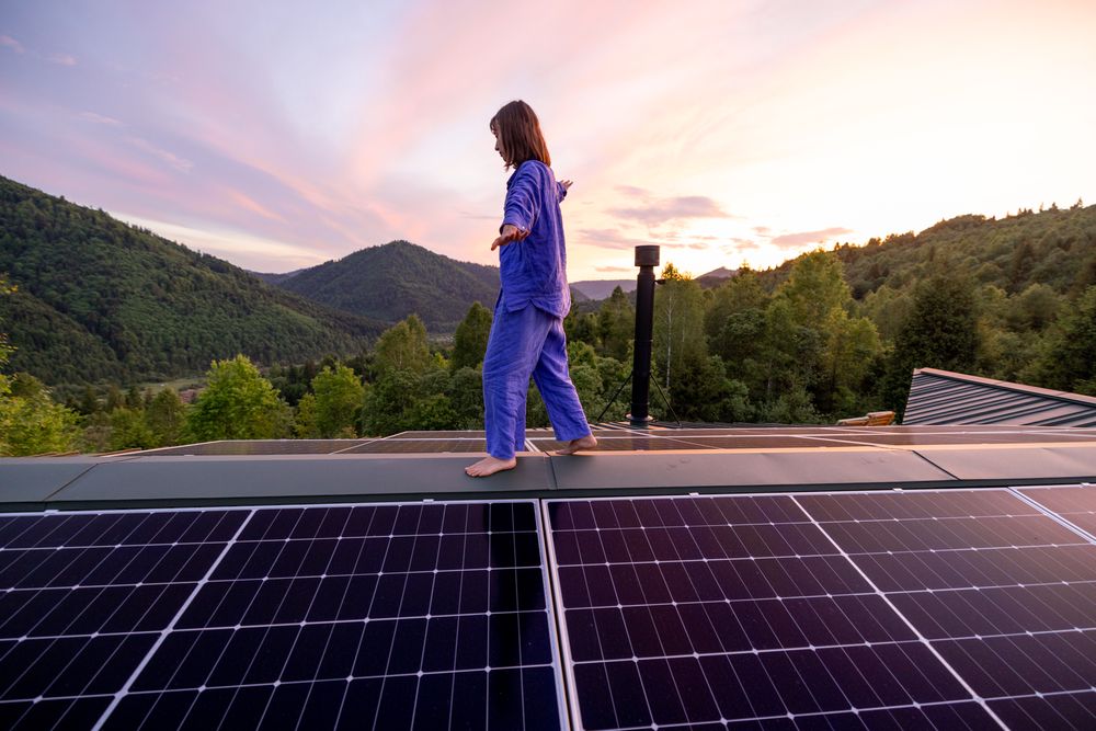 girl walking on top of solar panel